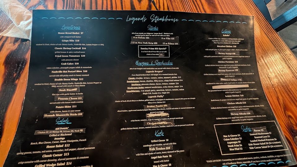 Printed menu with classic American dishes.